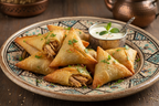 Mini Briwat Poulet - Moroccan crispy golden pastry triangles filled with spiced chicken and fresh herbs